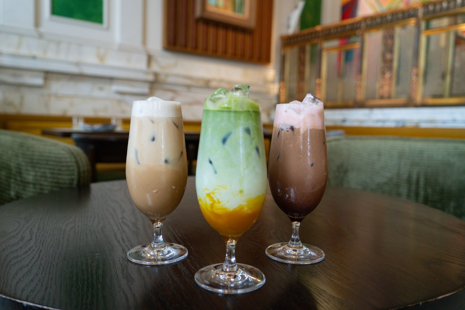 Three iced specialty drinks at The Bank Café